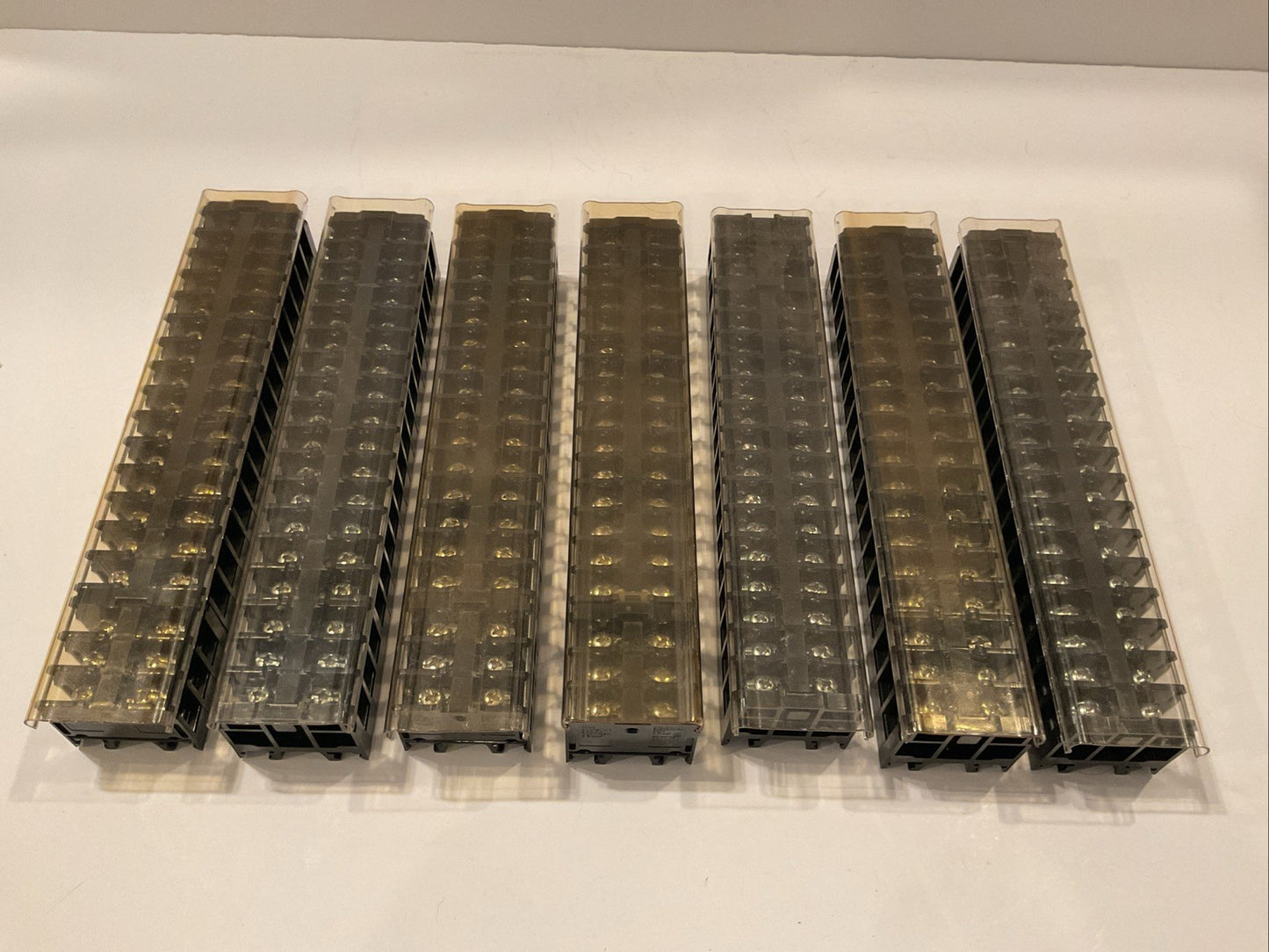 126  -  IDEC  #BNH15LWT  (7 LOTS OF 18 TERMINAL BLOCKS)  (600V MAX.) w/covers