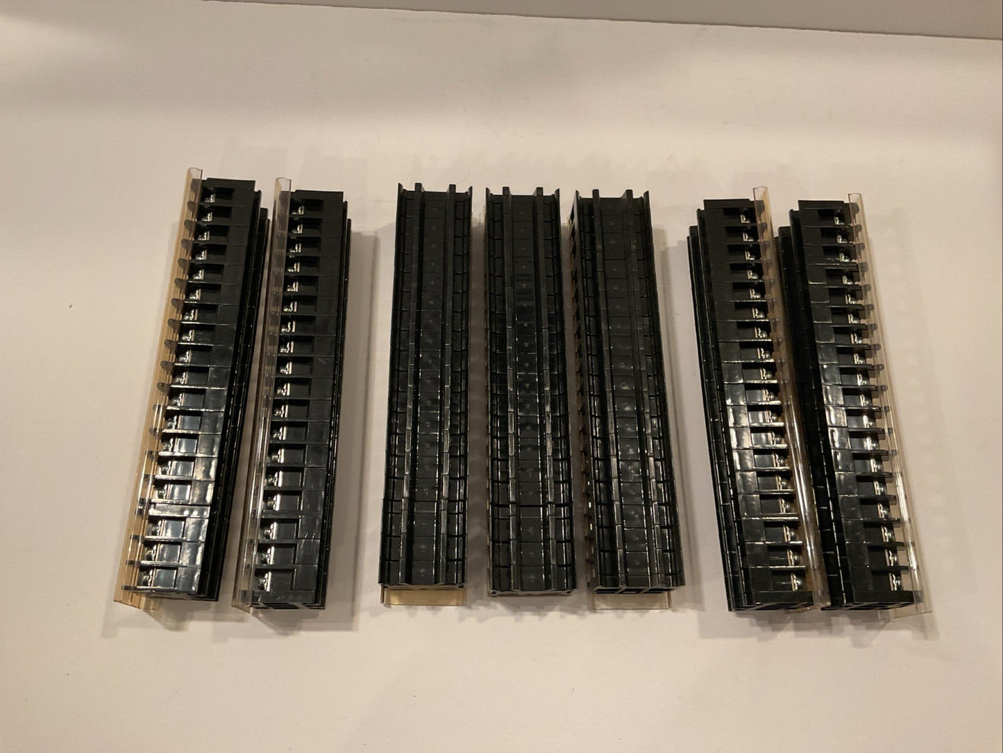 126  -  IDEC  #BNH15LWT  (7 LOTS OF 18 TERMINAL BLOCKS)  (600V MAX.) w/covers