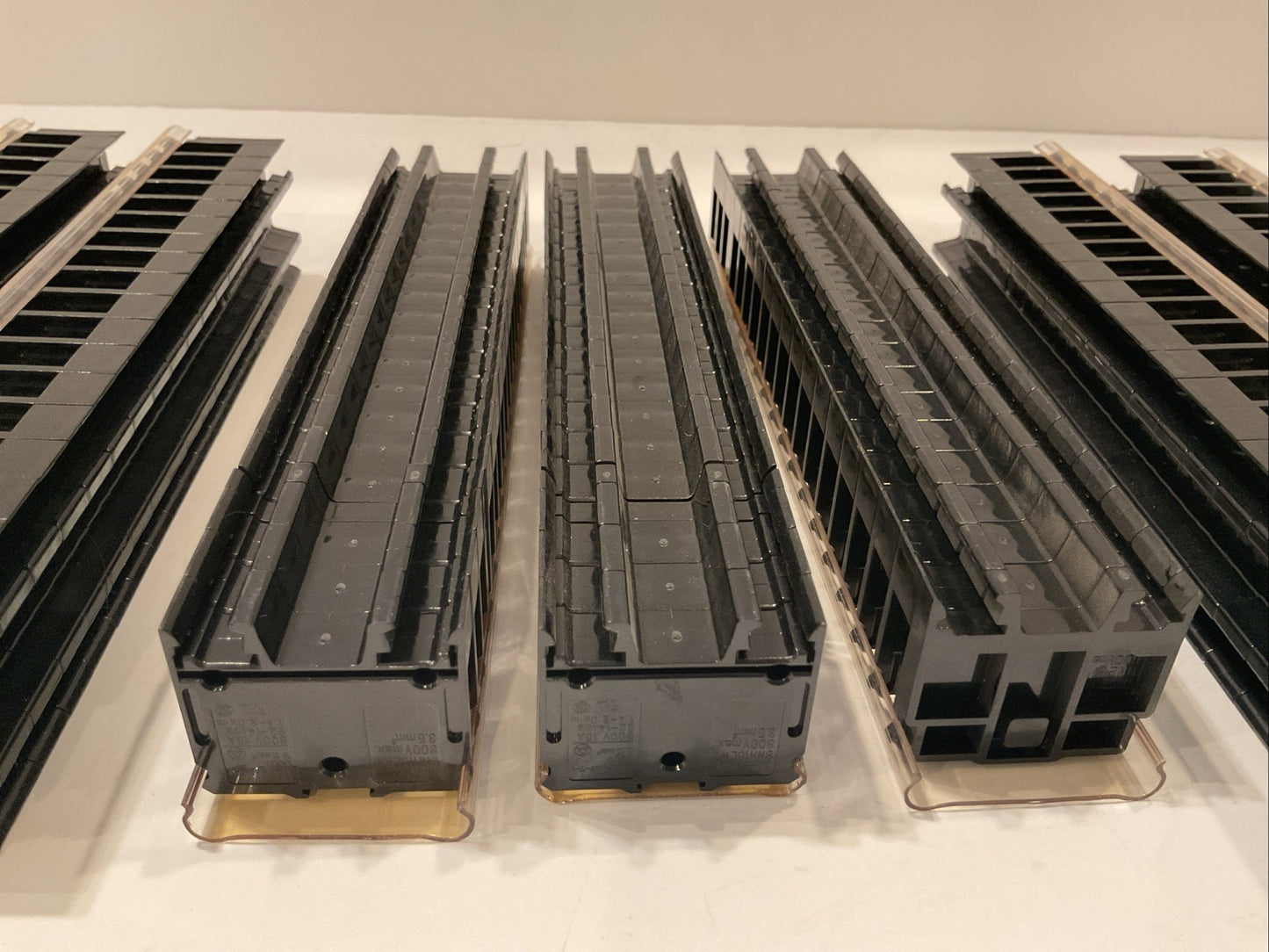 126  -  IDEC  #BNH15LWT  (7 LOTS OF 18 TERMINAL BLOCKS)  (600V MAX.) w/covers